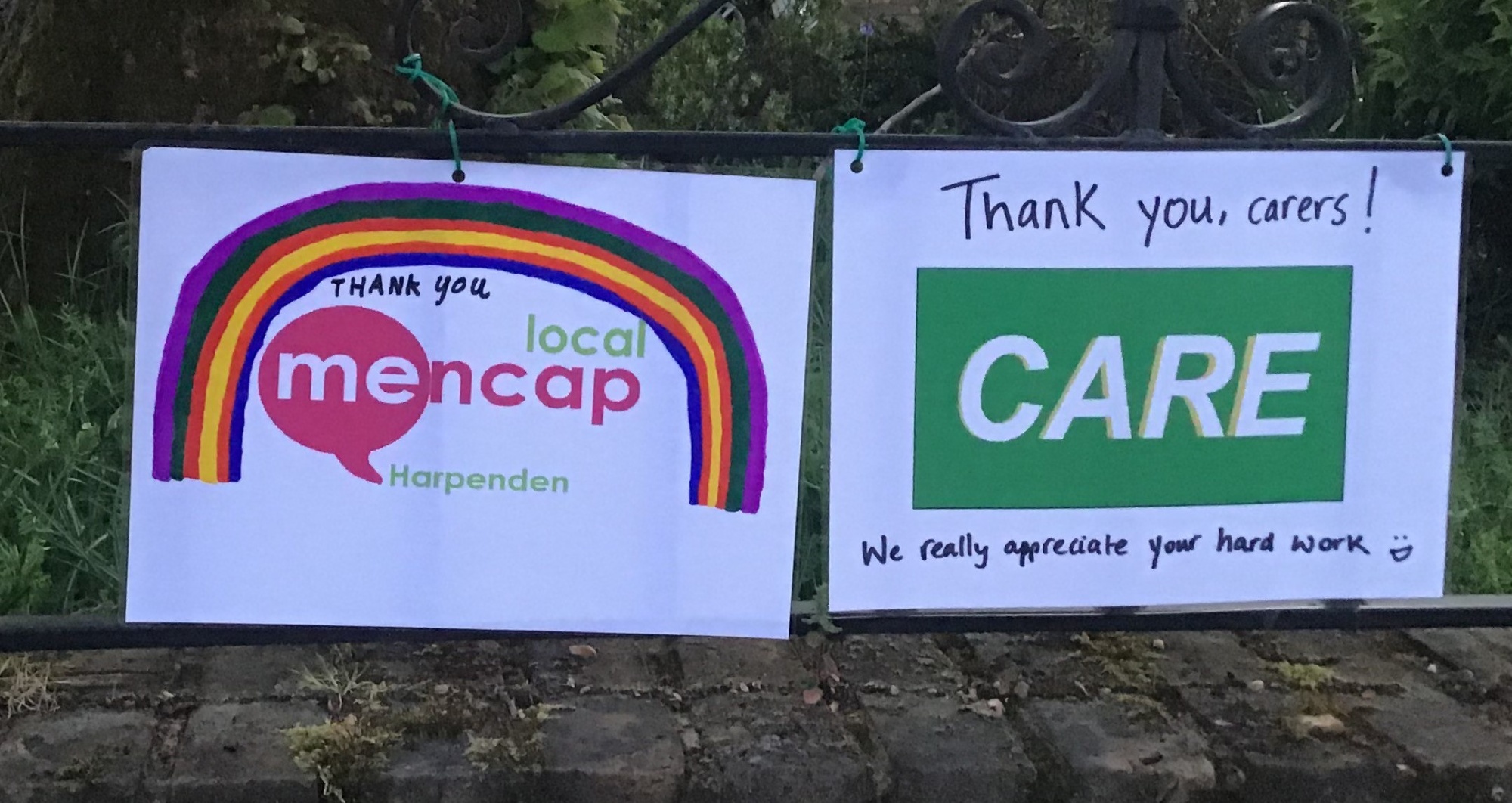 Two signs reading 'thank you carers, we really appreciate all your card work' | Harpenden Mencap
