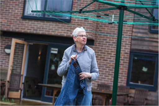 Person hanging out washing | Harpenden Mencap