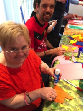 Two people smiling doing arts & crafts | Harpenden Mencap