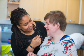 People Smiling at Each Other | Harpenden Mencap