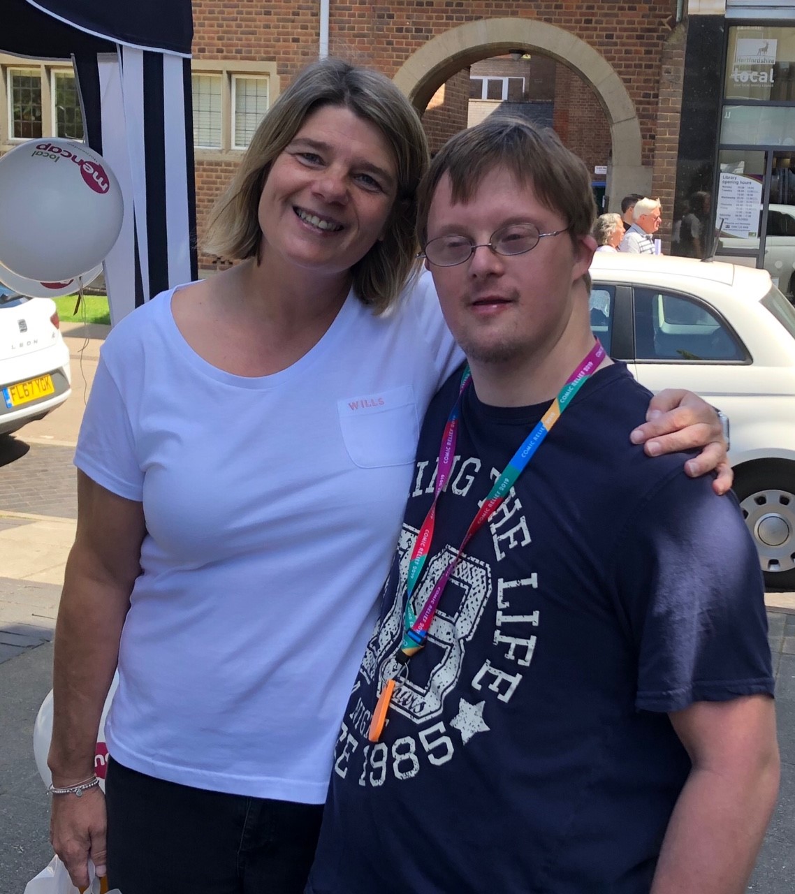 A man and woman smiling | Harpenden Mencap